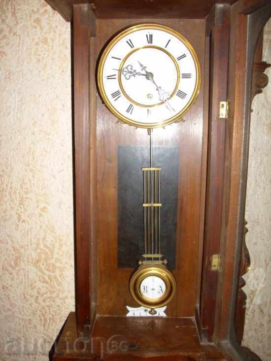 An old cabinet wall clock with price 750.00 BGN | € 383.47 An old cabinet wall clock with price 750.00 BGN | € 383.47
