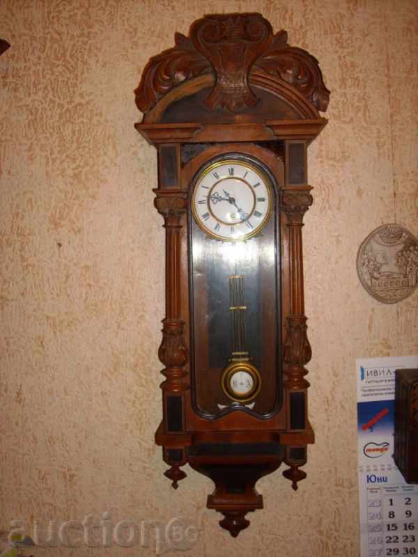 An old cabinet wall clock