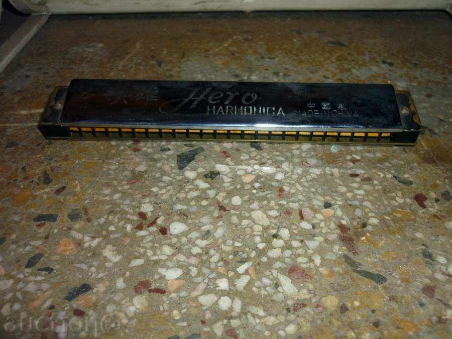 Auction Harmonica, a musical instrument Auction Harmonica, a musical instrument