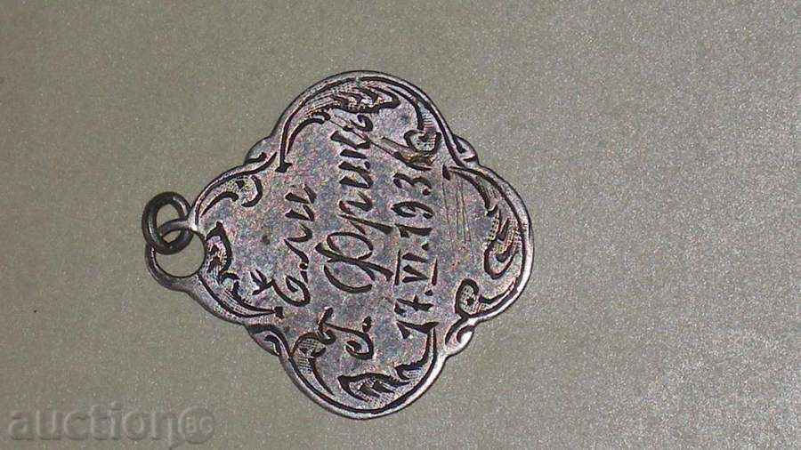 Old silver medallion.