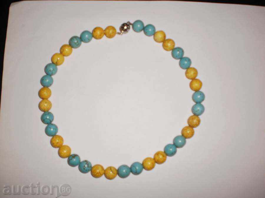 Κολιέ από μπλε και κίτρινο τυρκουάζ με τιμή 55.00 BGN | € 28.12 Κολιέ από μπλε και κίτρινο τυρκουάζ με τιμή 55.00 BGN | € 28.12