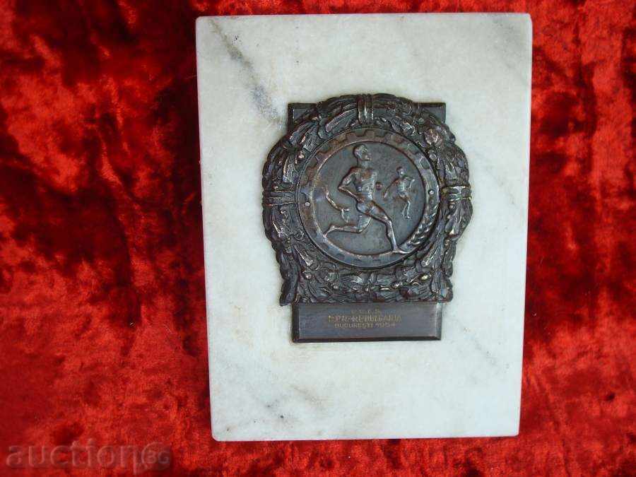 Brass plaque, sports "C.C.F.S.BUCURESTI1954" on a marble tile