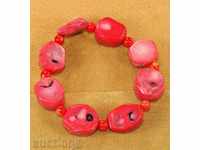 ROUND WITH NATURAL RED CORAL