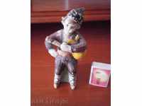 Old statuette - Little playwright - glued