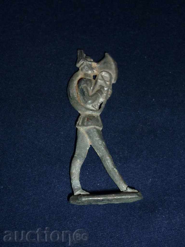 An old lead figure - a military musician