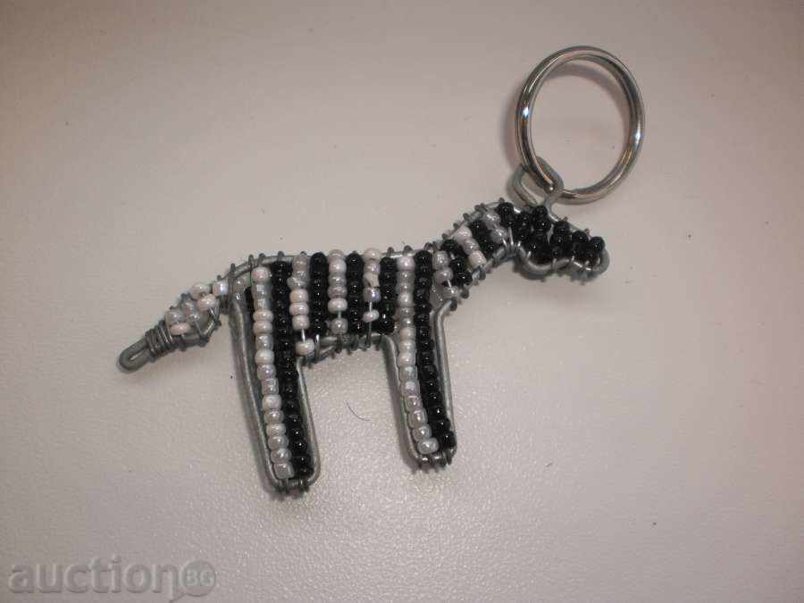 Breloc din sârmă și mărgele de nisip-dog cu preț 10.00 BGN | € 5.11 Breloc din sârmă și mărgele de nisip-dog cu preț 10.00 BGN | € 5.11