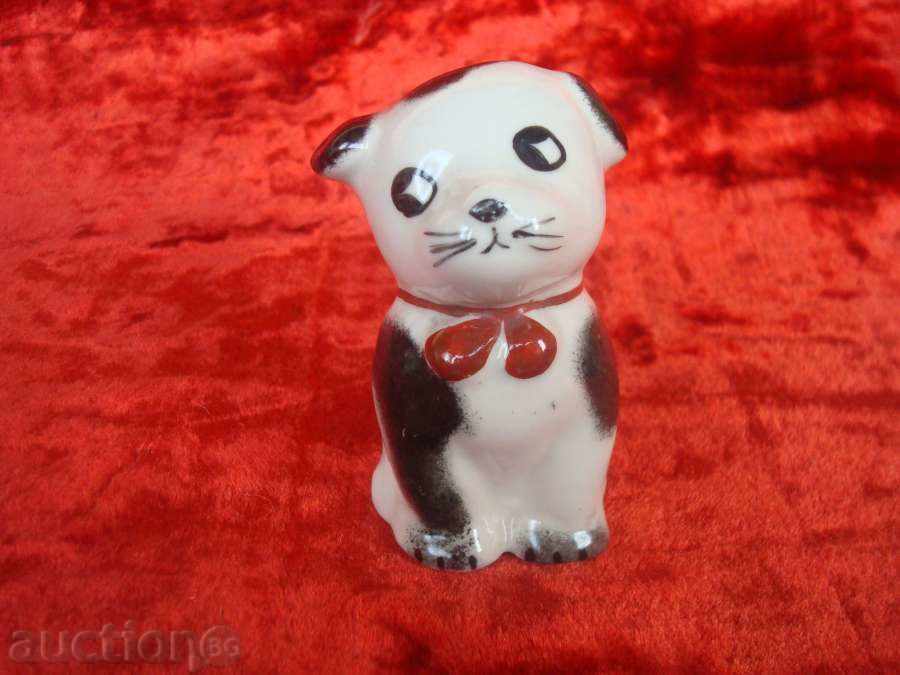 Porcelain, figure, small purebred dog,?