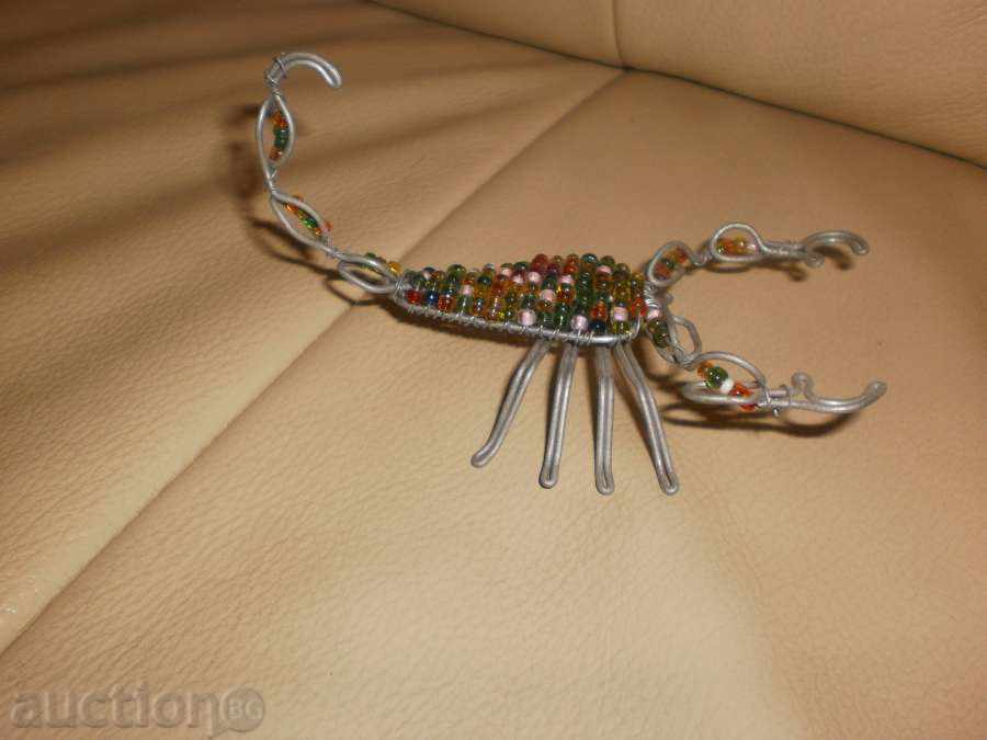 Scorpio-small figure of wire and sand beads - 6 Scorpio-small figure of wire and sand beads - 6
