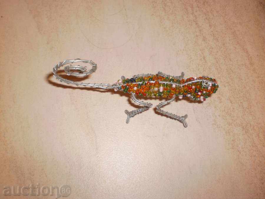 Auction  Gicone - a figure of wire and sand beads, see the price