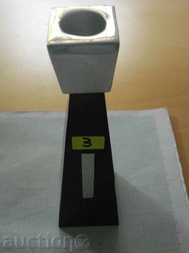 Auction  Candlestick made of wood and metal