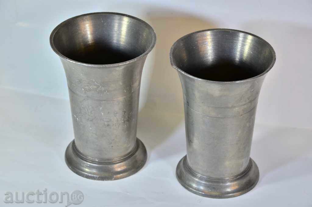 Decorative zinc cups.