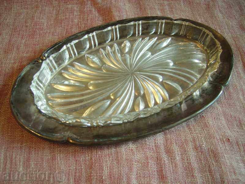 I sell a glass tray with a silver plate