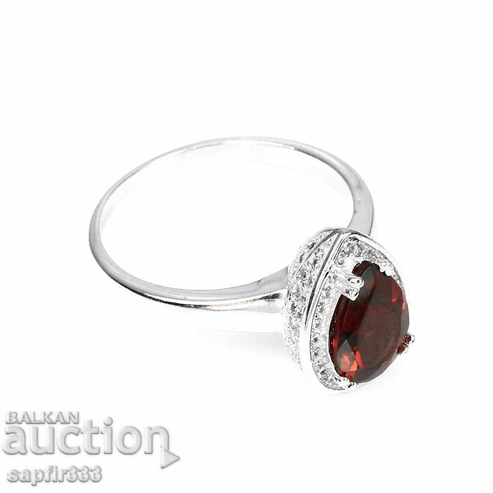 Auction USED SILVER RING WITH NATURAL GRANATE AND CYCLONS Auction USED SILVER RING WITH NATURAL GRANATE AND CYCLONS
