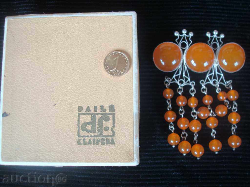 Brooch with amber, white metal, size 90x80mm.. Brooch with amber, white metal, size 90x80mm..