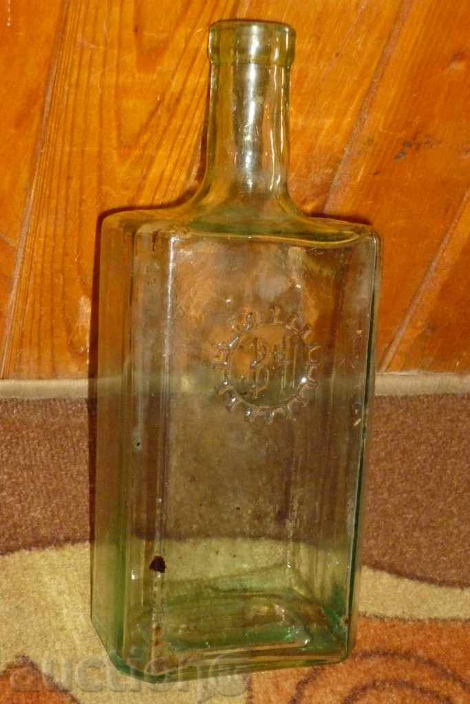 An old bottle, a bottle, a glass, a tamarind, a jar