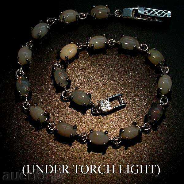 Auction  SILVER GREEN WITH OVALS