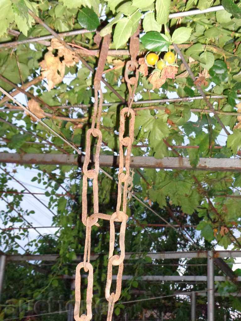 Delivery of An old forged chain, wrought iron, a singer for a hearth Delivery of An old forged chain, wrought iron, a singer for a hearth