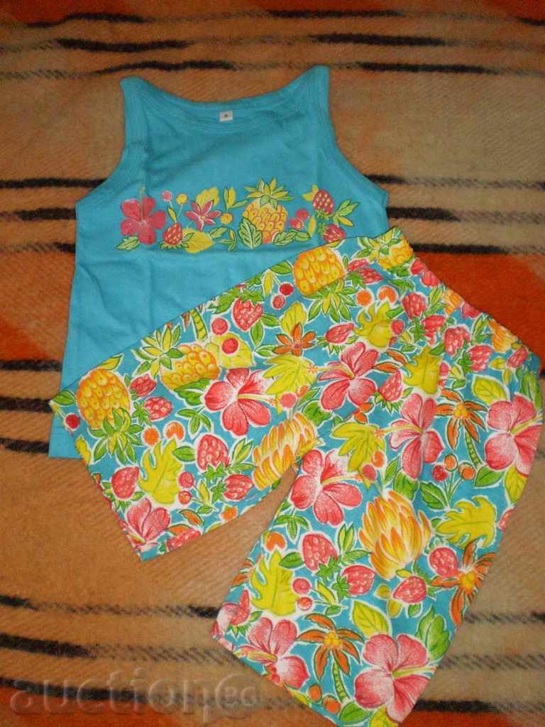 Delivery of Set for 3-4-year-old girl in t-shirt and shorts with fruit