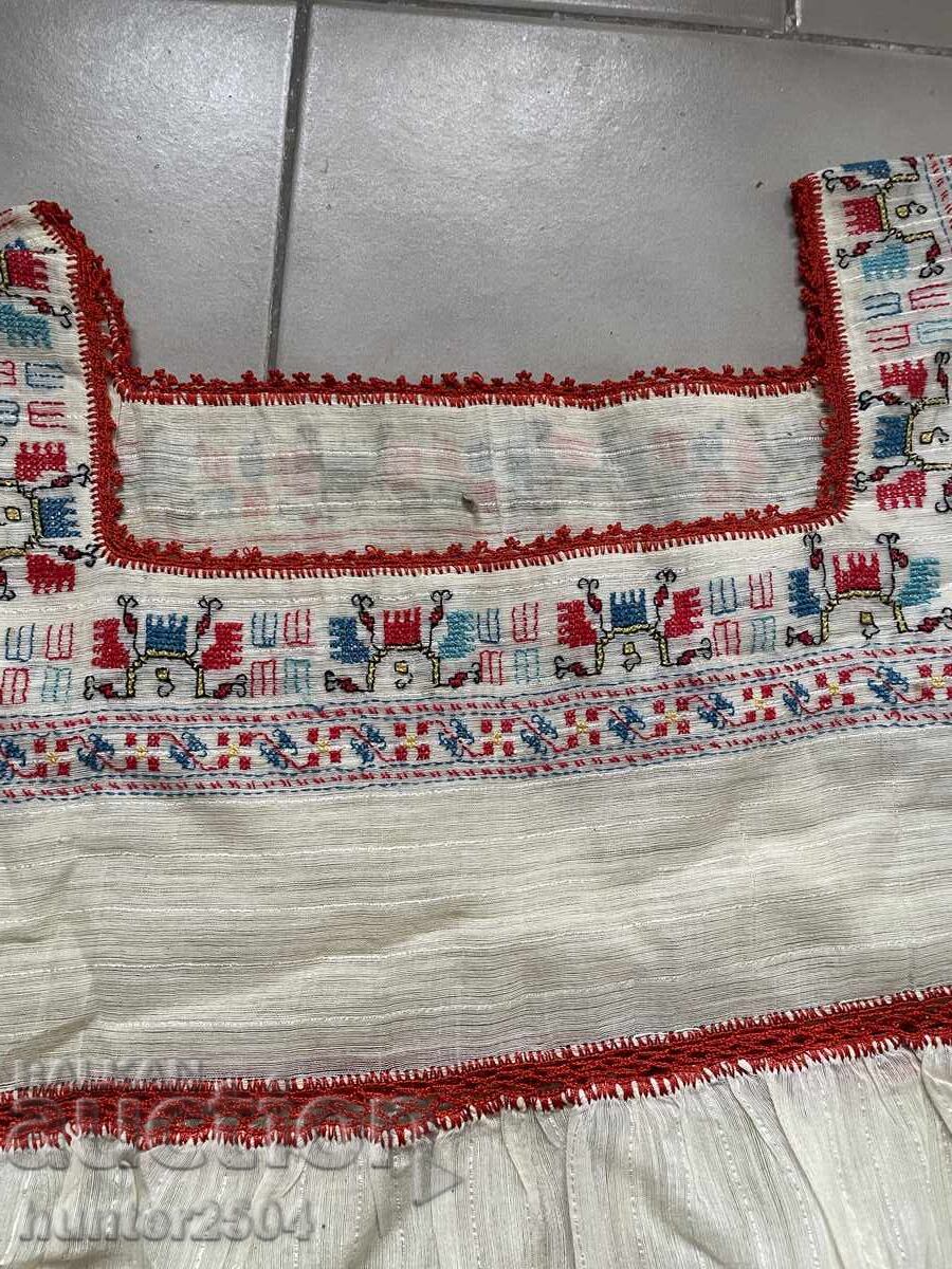 Delivery of A shirt with embroidery Delivery of A shirt with embroidery