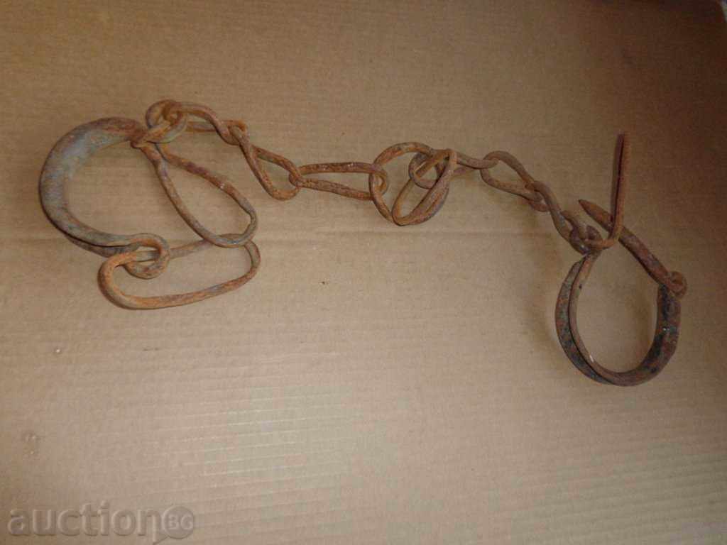 Old forged buckles, shackles, shackles, chain Old forged buckles, shackles, shackles, chain