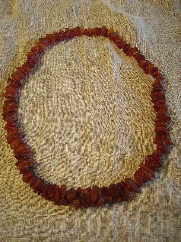 Delivery of I sell a red amber necklace of untreated pieces