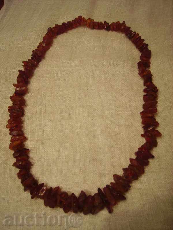 I sell a red amber necklace of untreated pieces