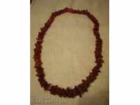 I sell a red amber necklace of untreated pieces