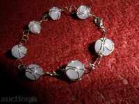 GRIVΝΑ με λιλά πετράδια