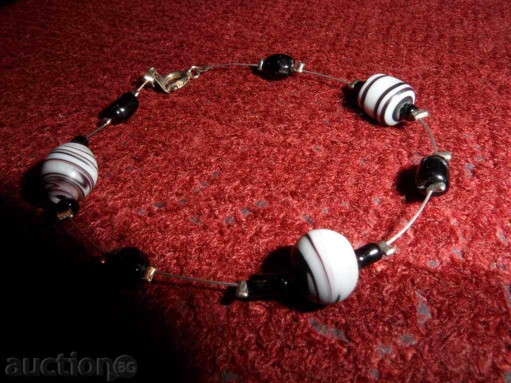 RING with black and gray-black elements with price 6.99 BGN | € 3.57 RING with black and gray-black elements with price 6.99 BGN | € 3.57