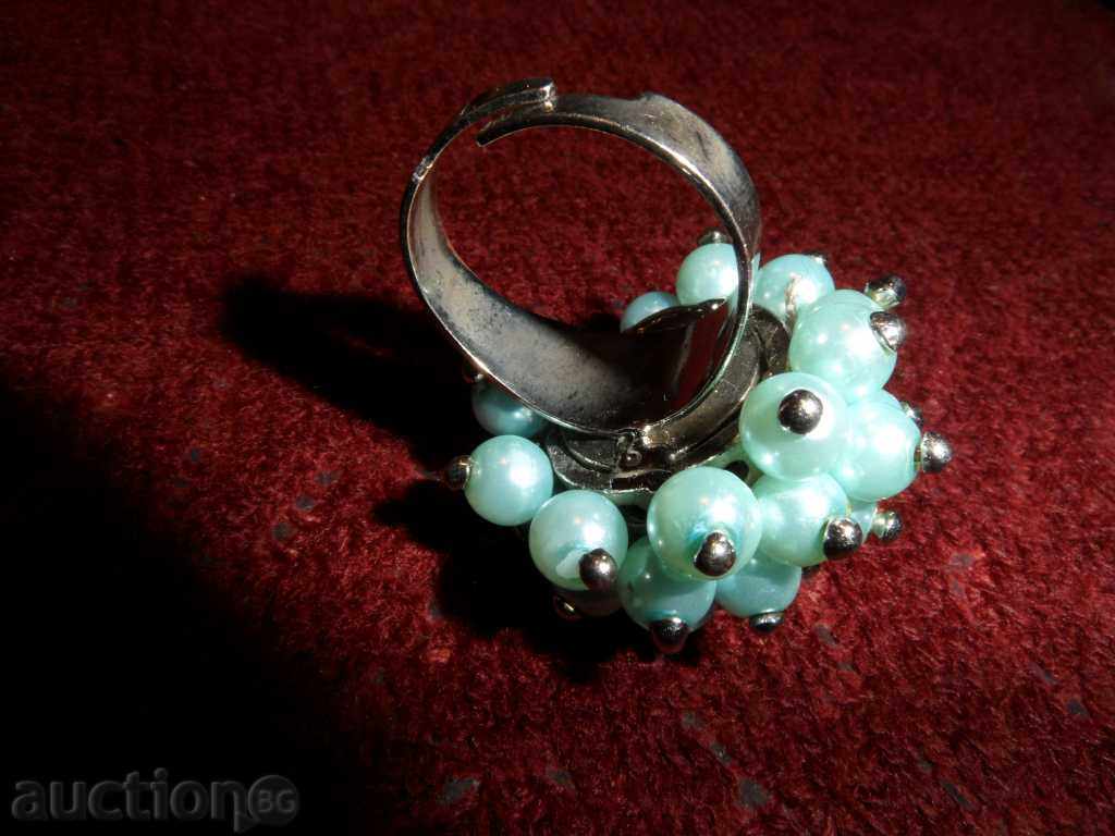 Auction RING with green pearls Auction RING with green pearls
