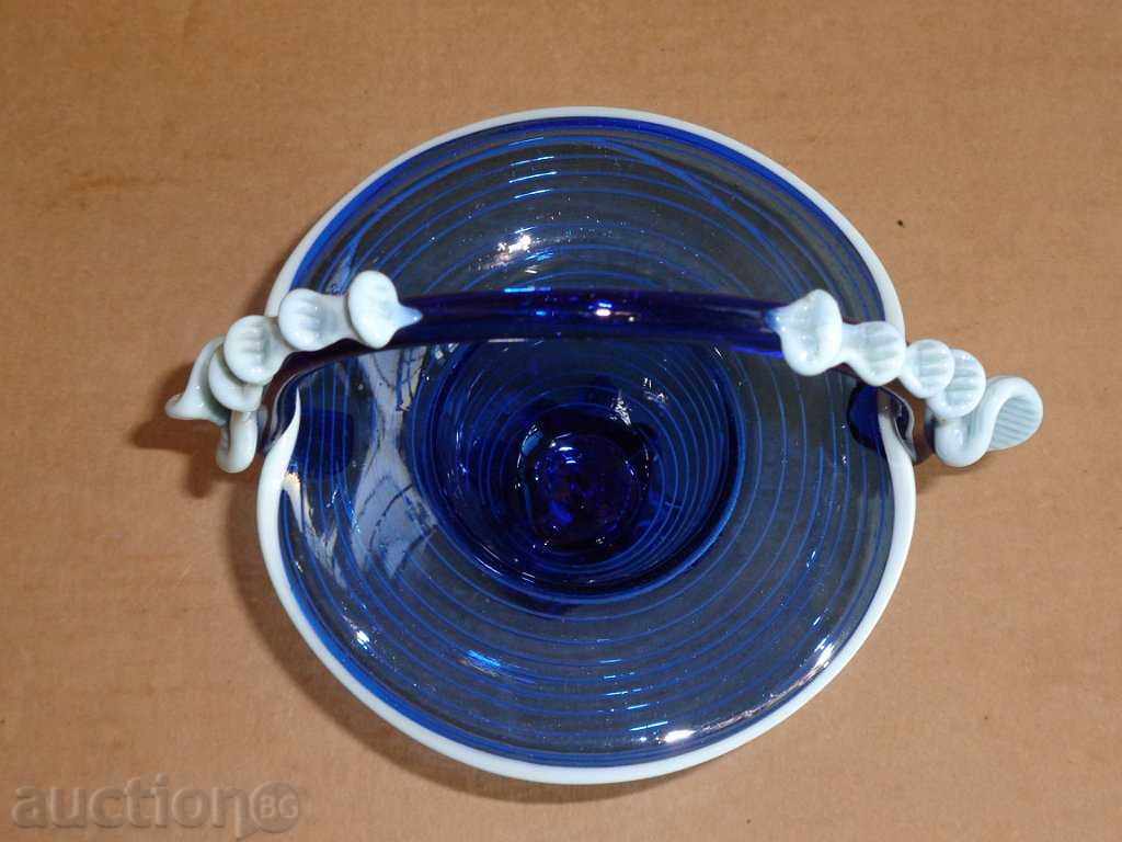 Auction  An old glass basket, a candy bar, a fruit bowl