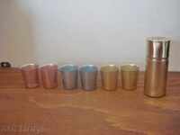 Old non-ferrous metal cups with stand