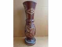 Old wooden vase for dry flowers