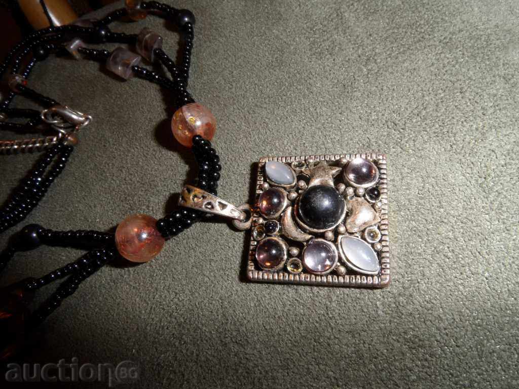 Auction COLOR black beads and purple elements Auction COLOR black beads and purple elements