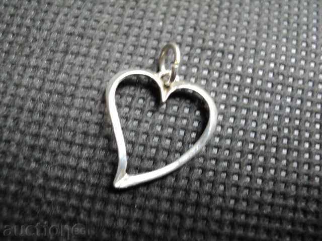 Auction Beautiful silver medallion heart Auction Beautiful silver medallion heart