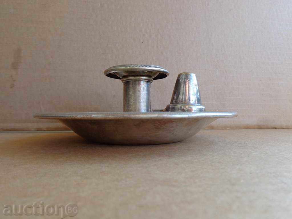 Auction  Old silver candlestick of the 19th century