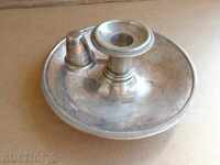 Old silver candlestick of the 19th century