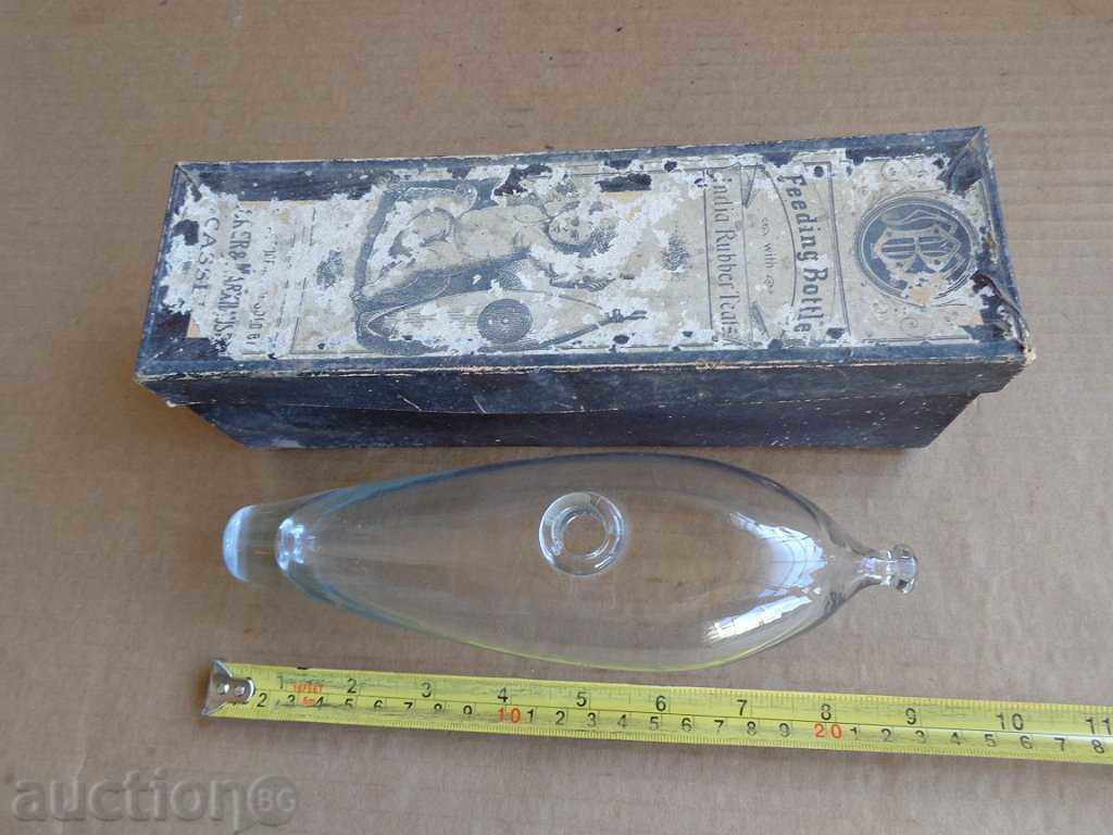 Auction  Old baby bottle, teat, pacifier from the early 20th century
