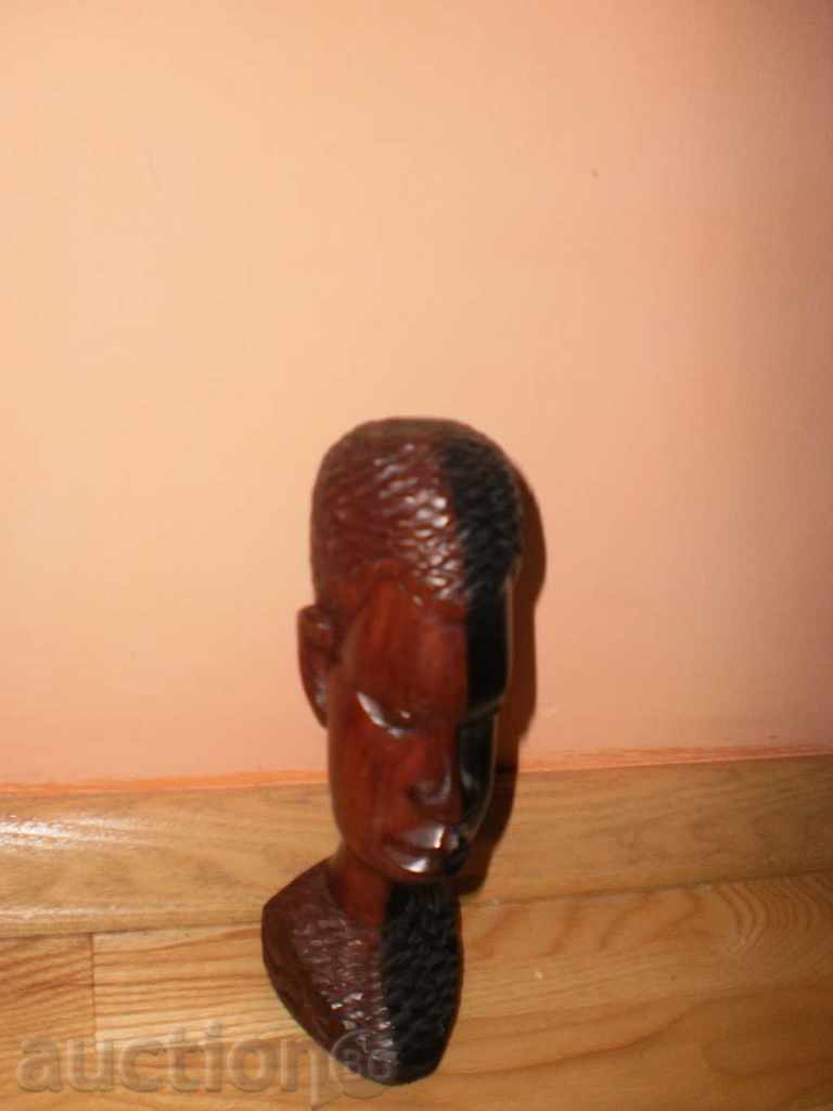 Auction  Head of male-figure from ebony-2