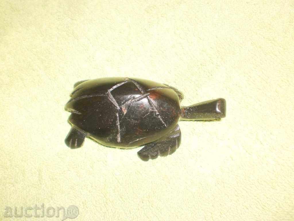 Delivery of Turtle-a small African figure of ebony-2
