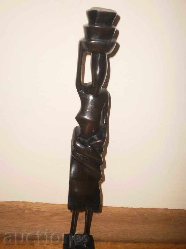 Auction Elegant candle-feminine figure of ebony Auction Elegant candle-feminine figure of ebony