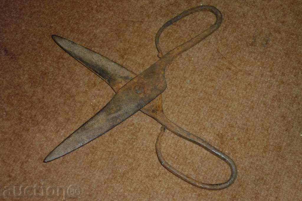 Delivery of An old forged scissors