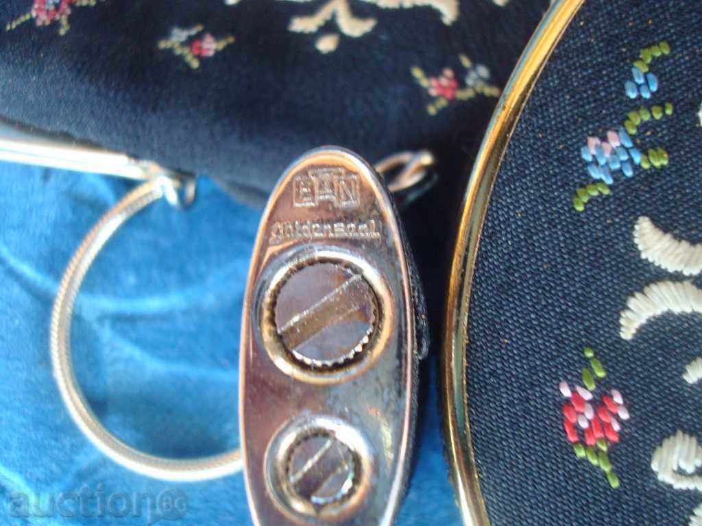 Auction Embroidered tapestry cigarette case, lighter and powder case Auction Embroidered tapestry cigarette case, lighter and powder case