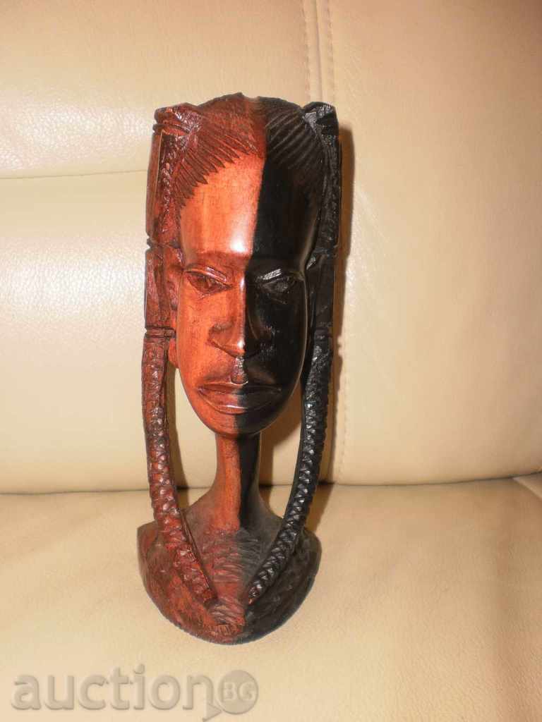 Head of a woman with an authentic hairstyle-ebony figure