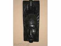 African mask of monolithic ebony wood