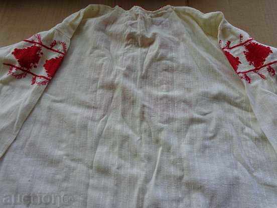 Auction  An old embroidered shirt from a costume for a boy in the early twentieth century