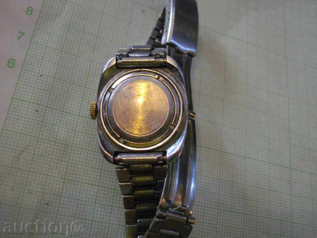 Auction Clock "SLAVA" ladies mechanic working Auction Clock "SLAVA" ladies mechanic working