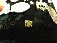 OMEGA badge // HUGUENIN product