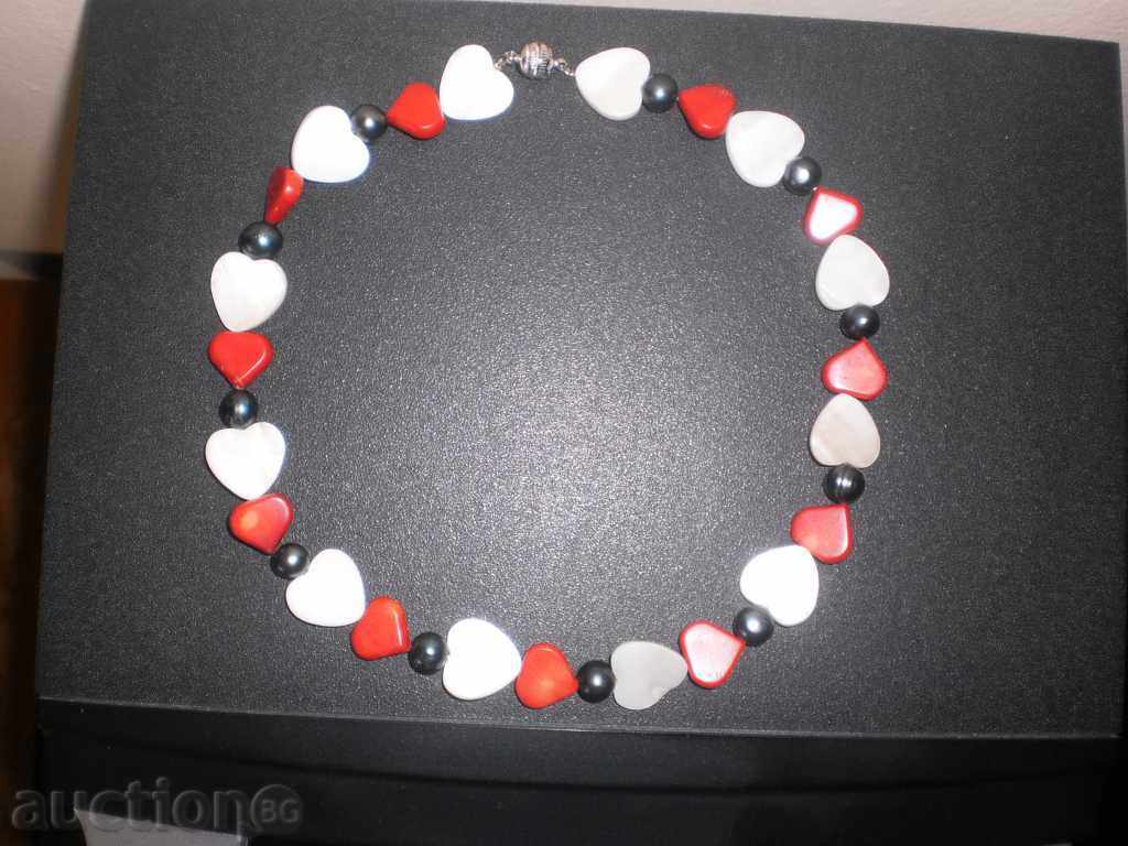 Cherry of red coral and heart-shaped pearls