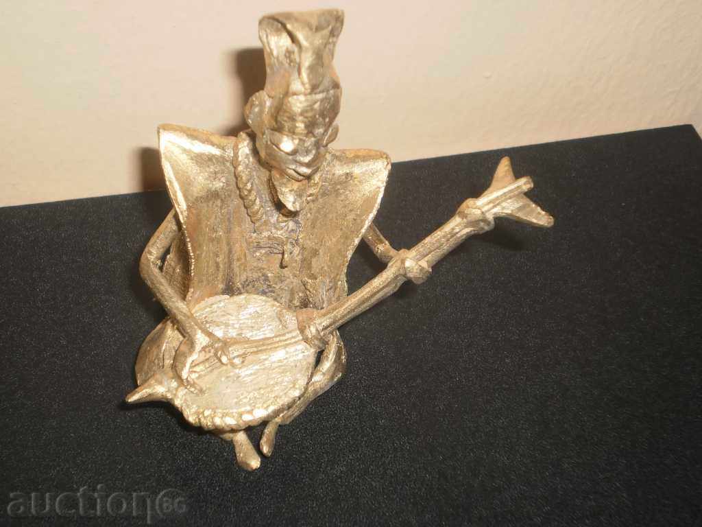 Auction Bronze figure of a musician with a calimba / hobbies / series Auction Bronze figure of a musician with a calimba / hobbies / series